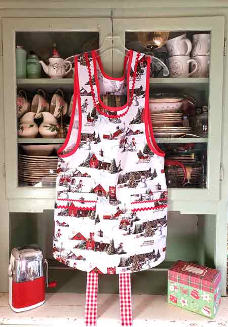 Red barn Christmas apron